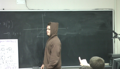 Figure 4: A classmate proposes a correction to the Group 1 presenter's eigenvector drawing. Figure 4: A classmate proposes a correction to the Group 1 presenter's eigenvector drawing.