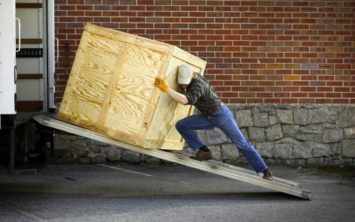 pushing crate up a ramp